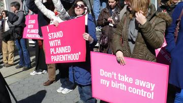 Protesting on the streets, supporters of Planned Parenthood vocalize their opinions. The possibility of Planned Parenthood being defunded has caused controversy in the political world.