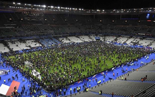 Hundreds+of+fans+run+on+to+the+field+of+the+Stade+de+France+after+one+of+the+deadly+attacks+was+carried+out+right+outside+the+stadium.+People+all+across+Paris+have+felt+the+shockwaves+of+the+attacks+as+families+and+friends+search+for+answers+in+the+aftermath.