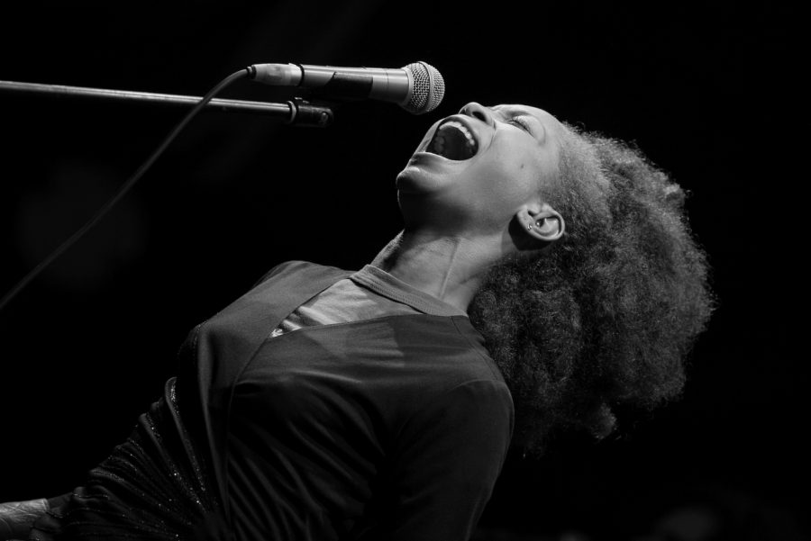 Performing as always, Erykah Badu was one of a few people who debuted with the official genre of Neo-Soul. She brought Neo-Soul music to mainstream music by the success of her LP, Baduizm.
