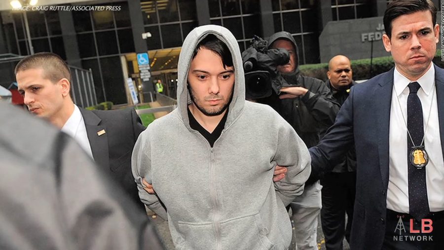 Arrested+by+FBI+agents+in+2015%2C+young+entrepreneur+Martin+Shkreli+walks+out+of+his+Manhattan+apartment+to+look+his+many+years+of+fraud+schemes+in+the+eye.+News+of+Shkreli%E2%80%99s+future+trial+has+brought+America%E2%80%99s+attention+back+to+the+schemer.+