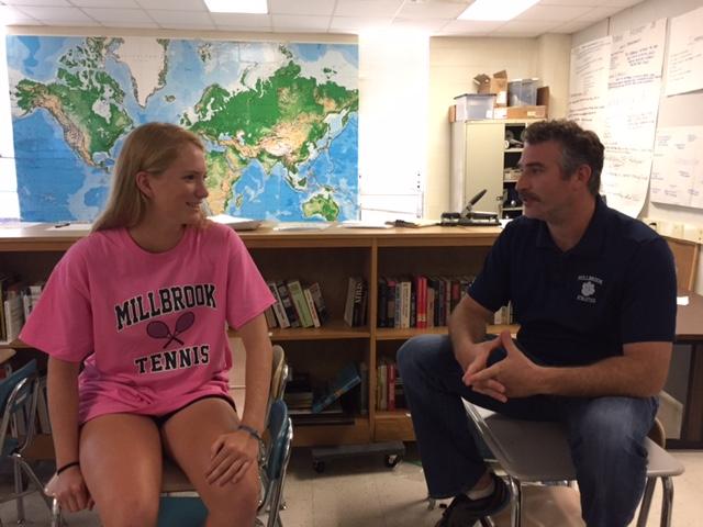 Discussing new ideas for the Investment Club with adviser Mr. Hosking, sophomore and president of the Investment Club Caroline Lewis does her duty as president. The Investment Club has many guest speakers come in to educate members about investing.