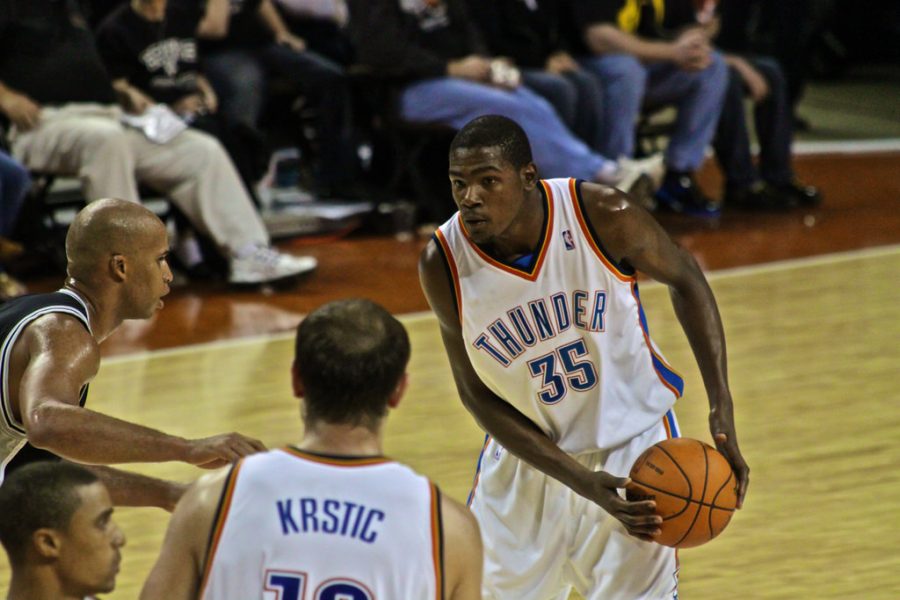 Unknowing of his future, a young Kevin Durant looks to make a play for the Thunder. Many fans will always associate the orange and blue jerseys with Durant after his 9 year stint in Oklahoma City.