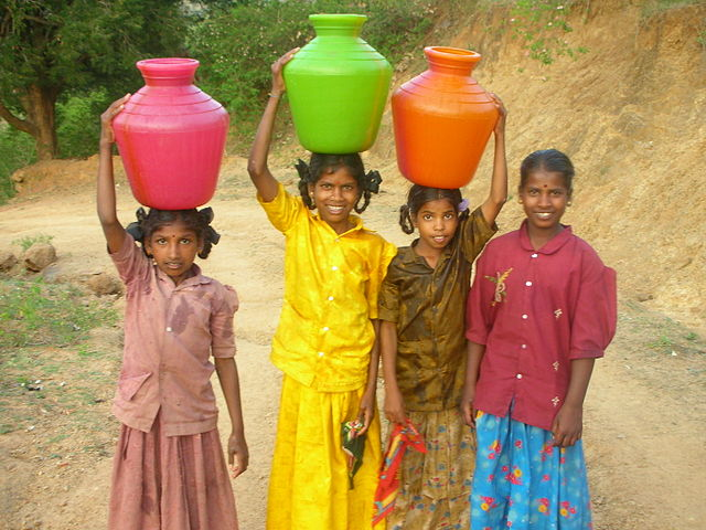 Carrying water for their families instead of being in school, these young girls are on the path to be impoverished their whole life. We must end the cycle of poverty by bridging the gender gap.