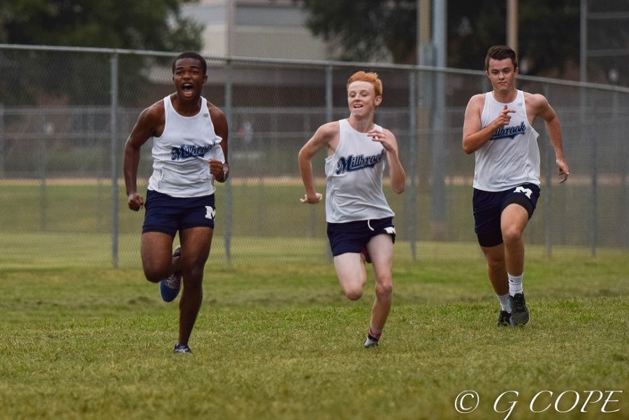 Racing to the finish line, Marcus Gibbs (Left), Matt Bryant (Middle), and Jeffrey Jones (Right) all give it their all for the XC team. The few points these runners potentially receive can be the difference between winning and losing a meet. 