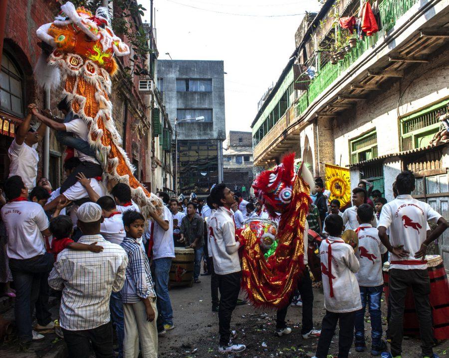 Gathering around in the streets of Kolkata, people are in the spirit for the Chinese New Year. Many decorations are hung around cities and towns in midst of the new year.