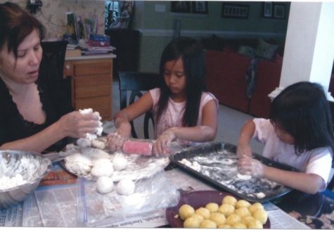 Making dough dumplings for a Vietnamese dessert called che, Kim Nguyen (left) enjoys teaching her grandaughters Mady Ignacio (middle) and Aly Ignacio (right) how to prepare Vietnamese dishes. Lunar New Year is a huge celebration for some and a household celebration for others but special nonetheless.