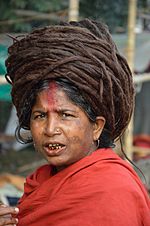 Sporting dreadlocks, this woman represents the Egyptian and Indian culture the hairstyle originated in. People of other cultures and races should be educated on the cultures that they are taking from.