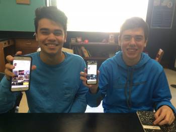 Showing off their social media accounts, juniors Jack Saundercook and Mark Malloy participate in the spread of information through social networking. Social media can be a great tool to share news and opinions, but also an easy way to spread unreliable and false information.