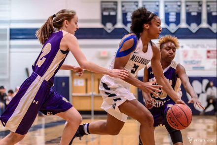 Driving down the baseline, #5 Kai Crutchfield shows off her athleticism. Though sometimes undersized, this team knows how to use that weakness to their advantage.