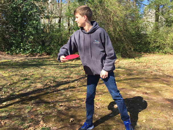 Enjoying the sport of Disc Golf, junior Adam Wenzel becomes a more experienced player with practice. Disc Golf is played throughout America, and the world, because of its eventful history.