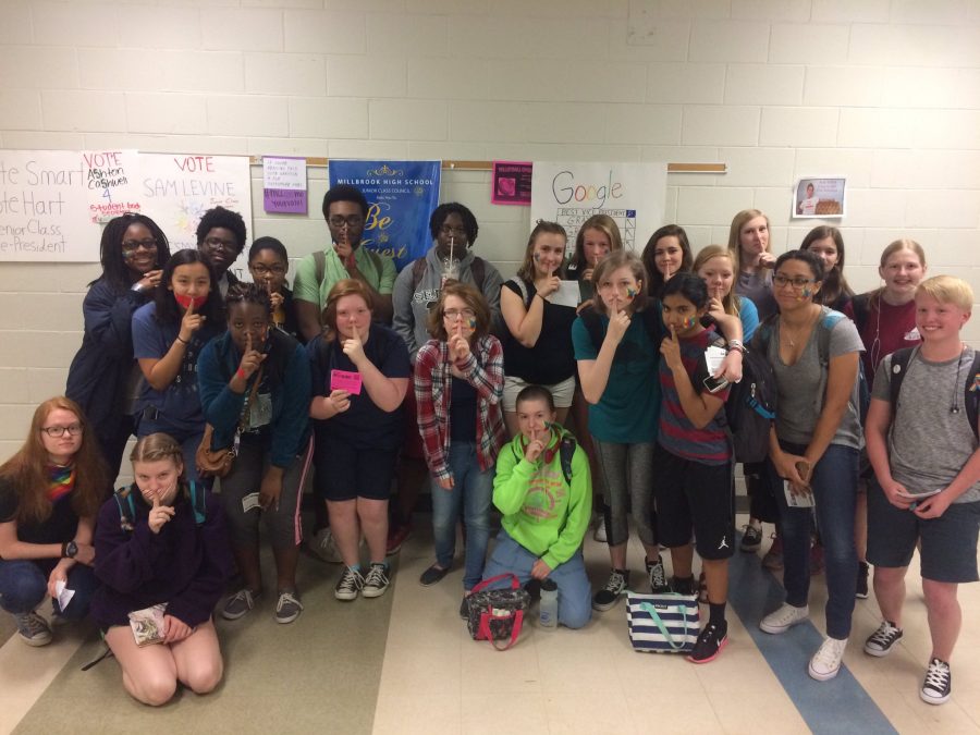 Participating in the ‘Day of Silence’, Millbrook students pose for a picture. This movement protests the bullying of the LGBT community and its members. 