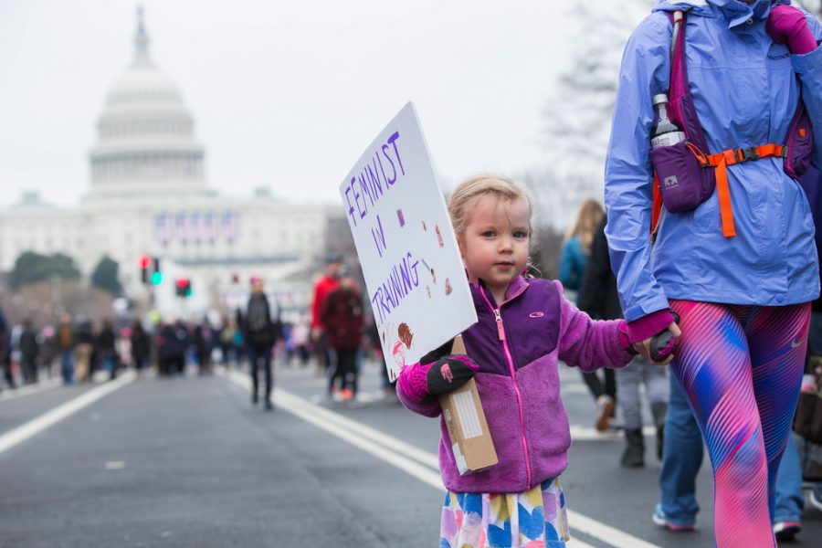 One of many mighty marchers, this tiny feminist was one of many who came out to support the women’s march last January. Kids like her are the future world leaders, and it is important to not hide the big bad world of politics from them.
