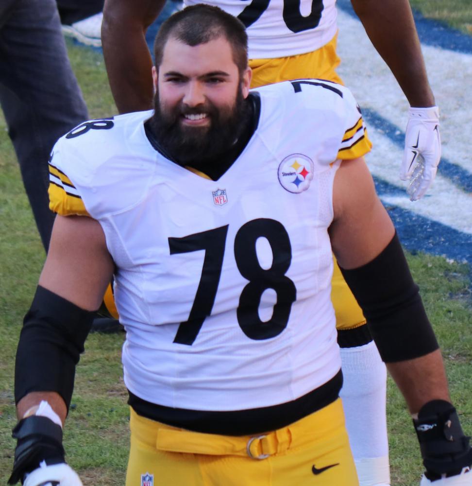 Walking off of the field Alejandro Villanueva pictured above smiles after a Pittsburgh Steelers win. Villanueva was the only Steelers’ player to come out of the locker room during the National Anthem prior to Sunday’s game.
