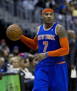 Dribbling a basketball up the court, Carmelo Anthony searches for a plan to score. Anthony was traded to OKC earlier today, teaming up with the reigning MVP Russell Westbrook, and Paul George. 