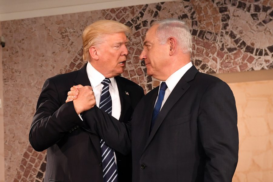 Shaking Israels Prime Minister Benjamin Netanyahu’s hand, President Trump visits the Israel Museum earlier this year. Prime Minister Netanyahu was pleased with President Trump’s recent decision to move the US embassy from Tel Aviv to Jerusalem. 