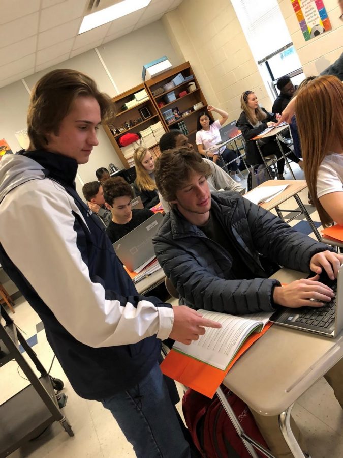 Helping out a friend, Owen Reynolds shows his dominant love language of acts of service by helping out Enzo Wolf with his classwork. This is one of many ways that love languages show you things about your relationship that you may not even know!
