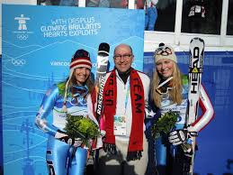   Celebrating her gold medal win at the 2010 Vancouver Olympics, Lindsey Vonn smiles for a picture with fellow American Julia Mancuso who won silver. This year Vonn was able to win a bronze medal in the downhill event. 
