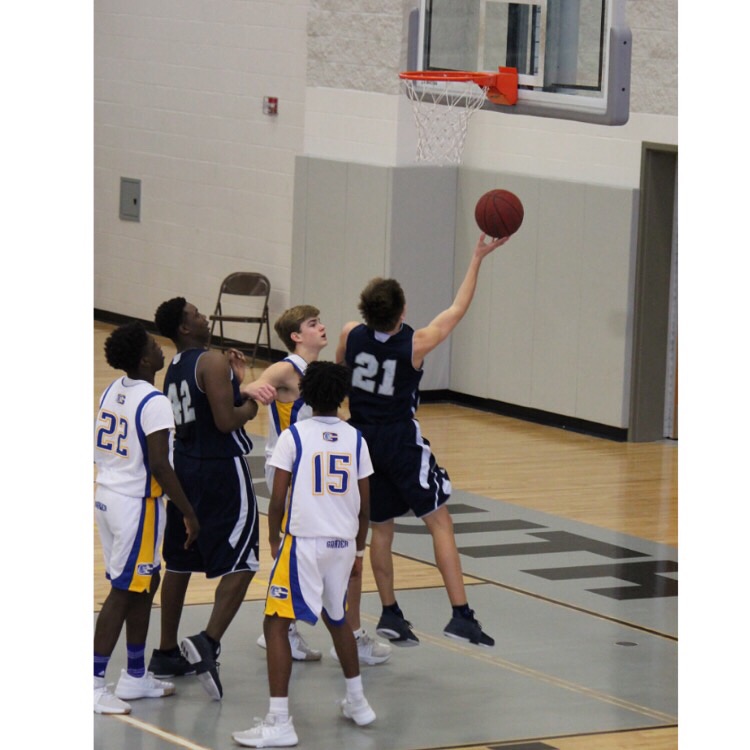 Going for a layup, freshman Ford Spainhour doesn’t let fear stop him from doing what he loves. Although fear seems scary, he reminds himself that it is not a bad thing to be afraid.