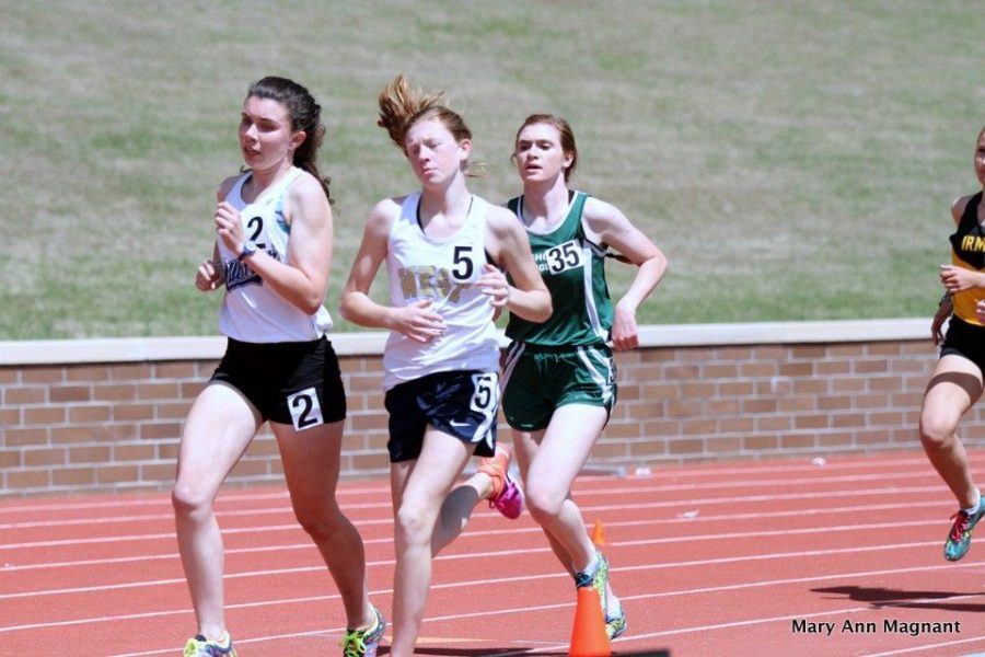 Leading the way in the Bojangles Invitational in Columbia, South Carolina, Sammy Storey, 2, speeds past in the mile during track season. This is just one of many things Sammy does here at Millbrook. 
