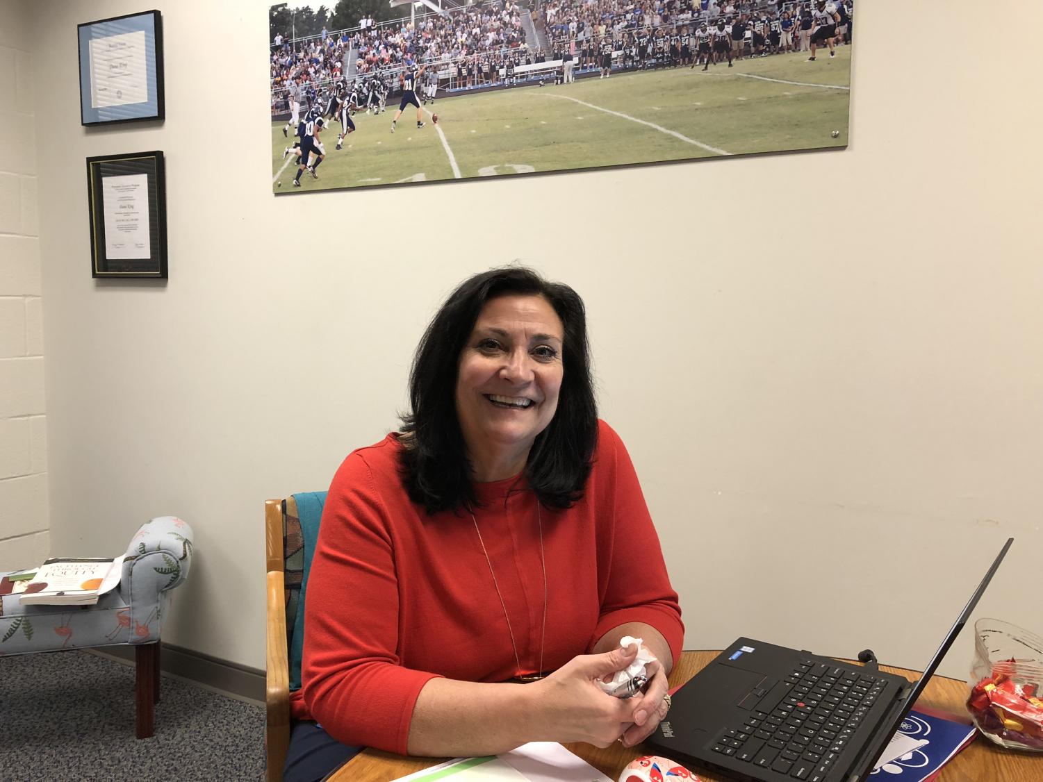 Posing for a picture, Mrs. King smiles brightly into the camera. After fifteen great years as principal, Mrs. King is retiring.