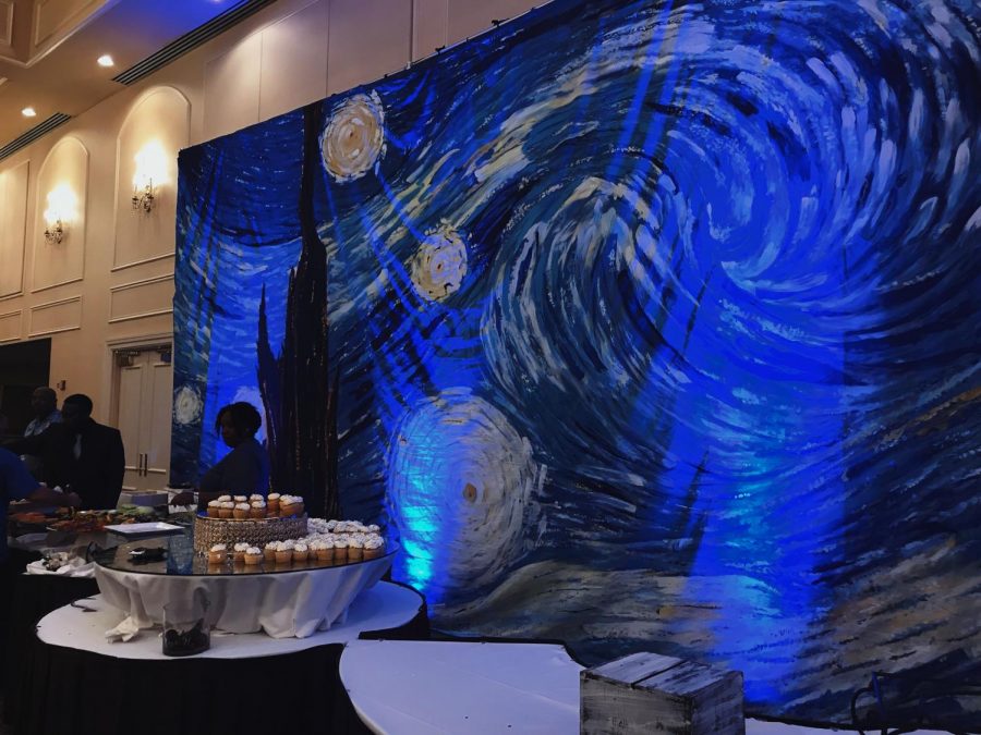 Hanging in the venue, this backdrop of Vincent van Gogh’s, Starry Night gave Millbrook’s prom a more romantic and artsy appeal. Millbrook students danced the night away at Friday night’s prom, and also had the joy of crowning their prom king and queen, seniors Bryan Squires and Raya Coley. 
