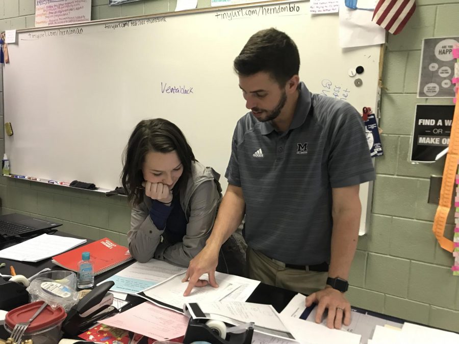 Working as science teacher, Mr. Herndons, teaching assistant, senior Kiley Willey is getting ready to graduate high school and start college at East Carolina University. For all other students also hoping to become a teacher, Millbrook offers a Teacher Cadet class to give them a look into what it would be like.