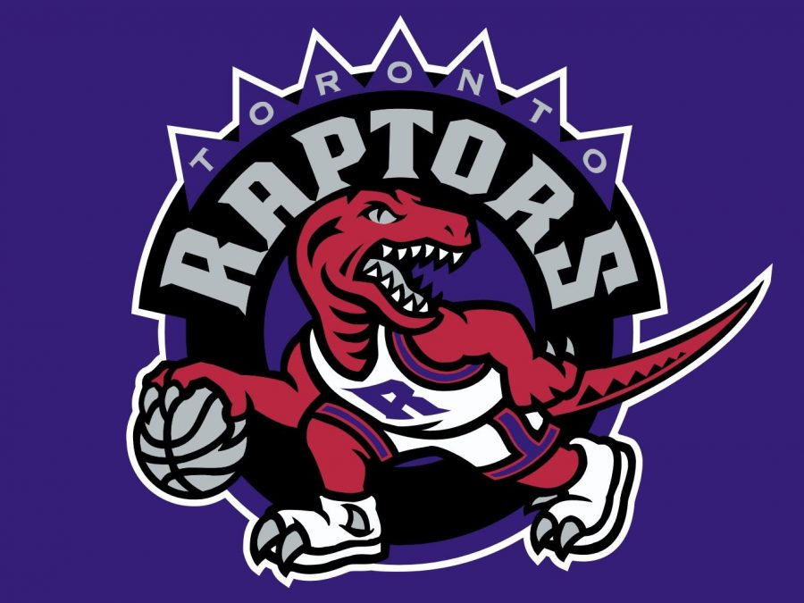 Dribbling+a+basketball%2C+The+sharp-toothed+aggressive+looking+dinosaur+became+the+face+of+the+Raptors+franchise.+The+Raptors+joined+the+league+in+1994+and+have+since+become+an+NBA+powerhouse.++%0A