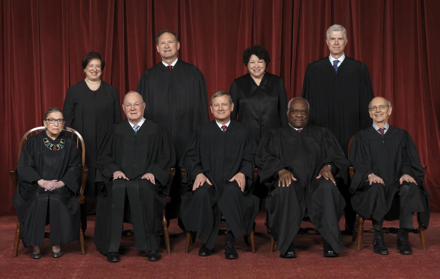 Smiling for the official Supreme Court photo, Neil Gorsuch is introduced as an Associate Justice with his fellow court members. After every new nominee is confirmed, an updated official portrait of the Supreme Court is taken.