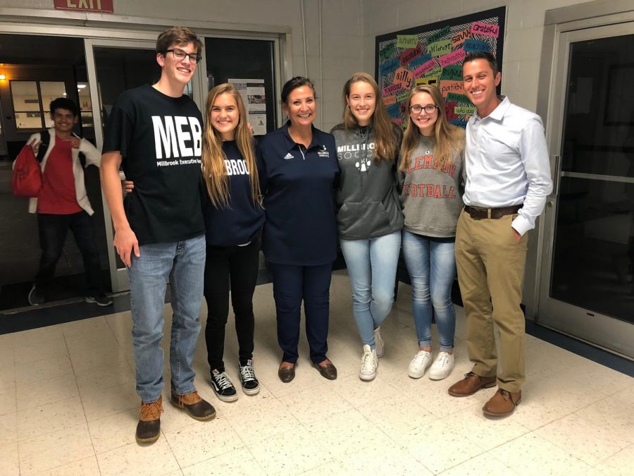 Posing for a final picture together, MEB officers stand with Millbrook principal Dana King and the principal of Jones Senior High School after a day helping their community. MEB along with SGA officers traveled to Jones County to deliver donated items to those in need after Hurricane Florence. You can help your community also by donating to the food drive at Millbrook to help feed families during the holidays. 