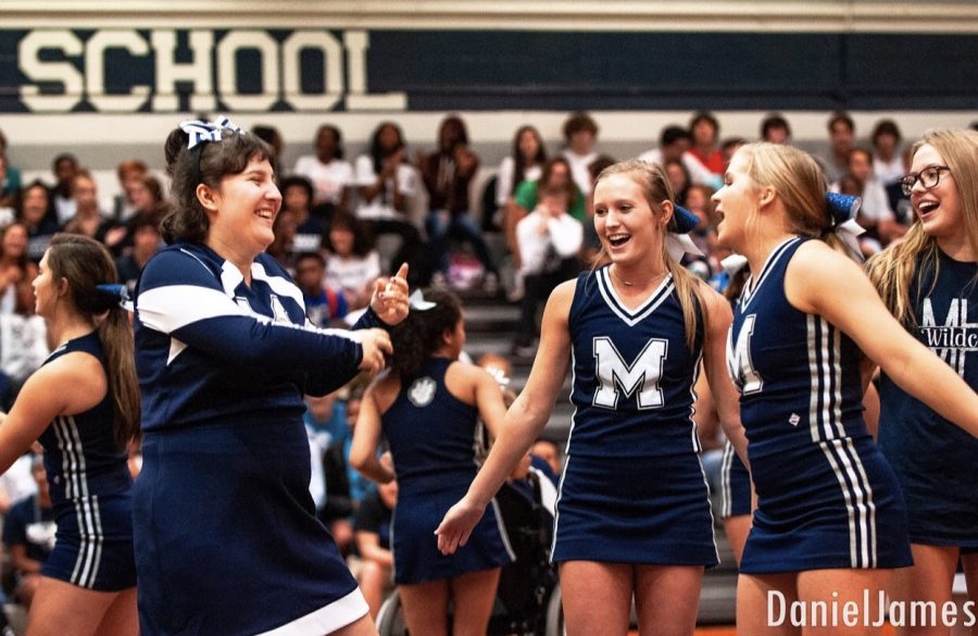  Surrounded by a roaring audience, Elite cheerleader, Savannah Livingston, accompanied with her friends Katie Day and Ella Schaffner, shows off her moves at the homecoming pep rally! There is no doubt this crowd brought vibes, shown by the huge smile on Savannah’s face!