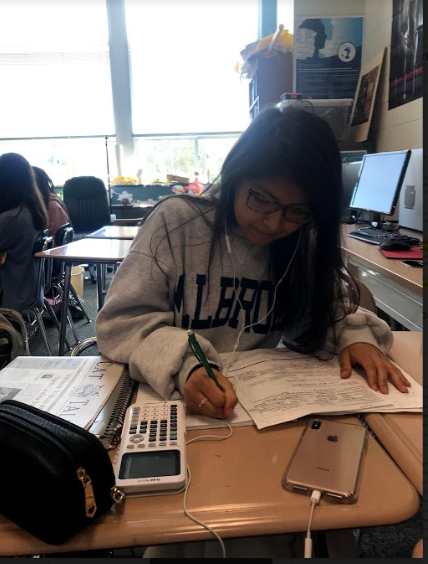 Studying for a chemistry quiz, Camila Villarroel Gomez listens to some of her favorite songs. Non-lyrical music can help you focus on your task without having your mind wander.
