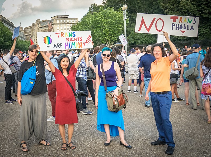 Outside of the White House, protesters take a stand against the new policy of the trans military. However, the supreme Court still has yet to finalize this policy and shut this currently open case. 