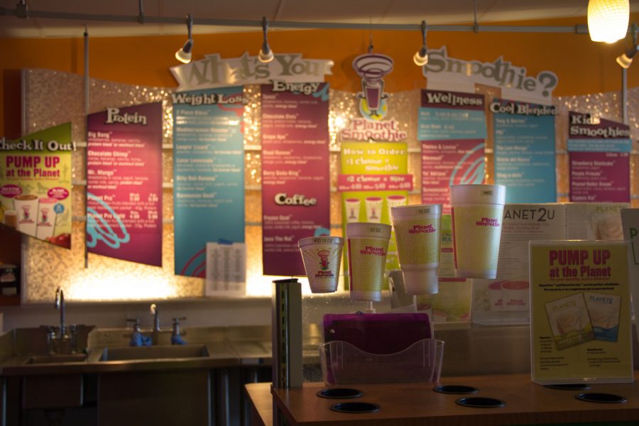 Glowing in the light, this image of Planet Smoothie showcases the four sizes available and the many different smoothie types. Tropical Smoothie Cafe, on the other hand, has only one size, but they do have a similar breakdown of smoothie flavors. 