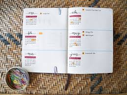 Displaying highlighted dates of importance for six months of the year, this bullet journal demonstrates a simple, yet organized spread. Bullet journaling is a practice that began in 2013 and is still widely used to maintain goals and organization. 