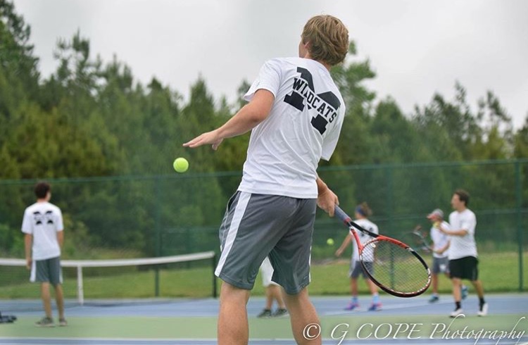 Swinging with precision, senior and Belmont Abbey tennis commit Alex Crabtree tries to score against his opponent. As formidable State Championship contenders, Coach Medina will rely heavily on Alex’s leadership this year to bring success to their young team. 