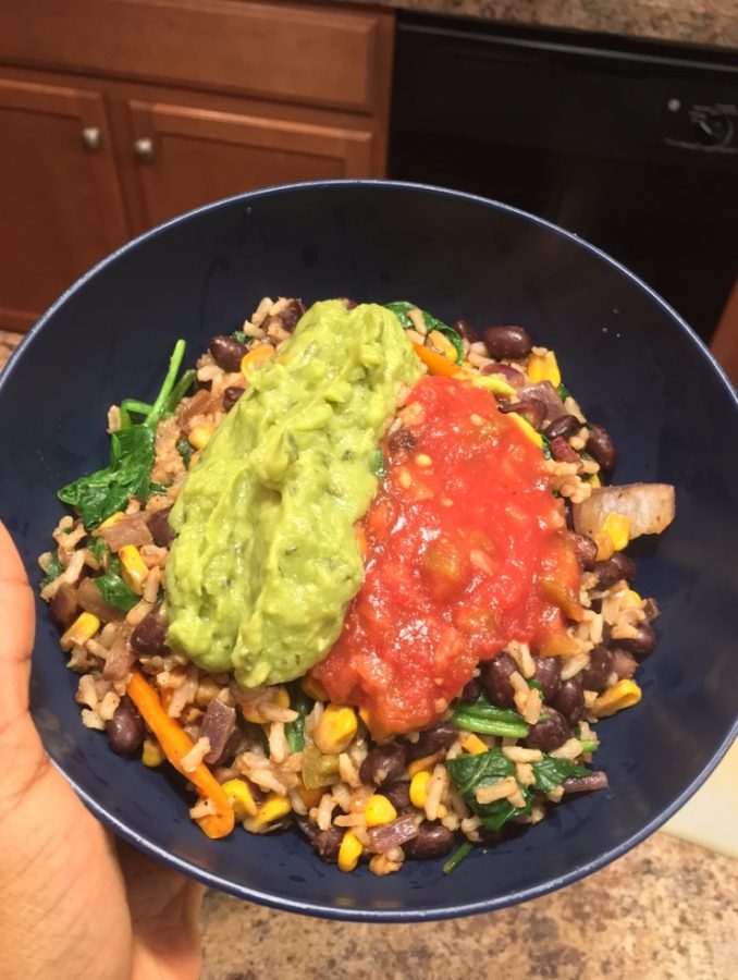Looking delicious, this burrito bowl is filled with healthy ingredients like black beans, spinach, bell peppers, red onion, and corn. When you get to make this Chipotle inspired bowl yourself, you get to pick and choose what you want, and can inspire new, innovative ways to eat. 
