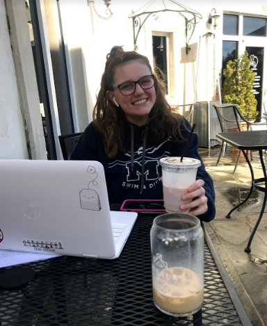 Sitting at Lafayette Village, sophomore Ashley Jean sips her iced coffee while working on a chemistry project. While it is completely normal to have coffee daily, you want to be careful to not grow dependent on this drink because it can lead to an addiction. 