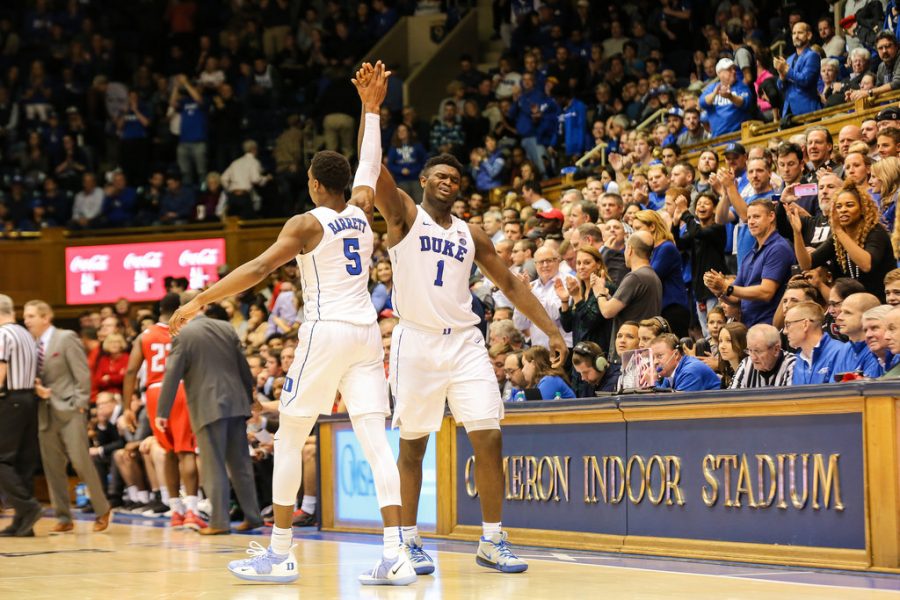 High+fiving%2C+forwards+RJ+Barrett+and+Zion+Williamson+congratulate+each+other+after+beating+Louisville+71-69.+The+Duke+Blue+Devils+have+a+great+chance+to+come+out+as+champions+of+the+NCAA+Tournament.+