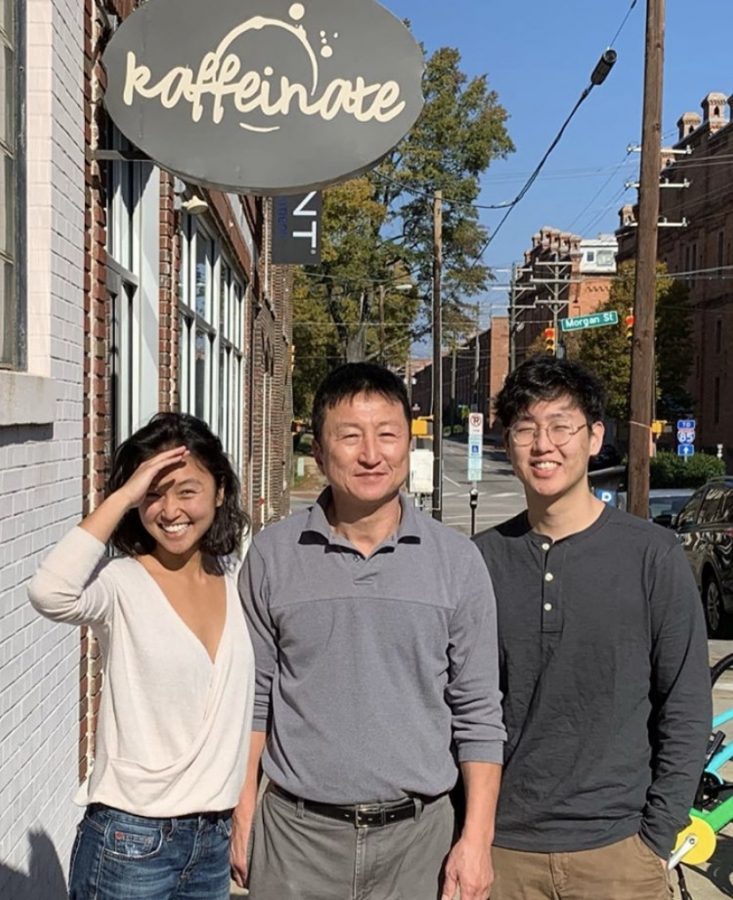 Standing alongside his two children, Kaffeinate owner Kong Lee smiles brightly outside of his store where a tragedy would later occur. Lee passed shortly after a gas leak in Durham led to an explosion on North Duke Street.