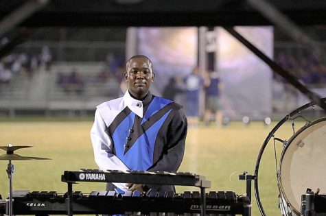 Standing on the sidelines, Britt drums with the Millbrook Marching band. Watch out for him next year as he continues to wow the crowd! 