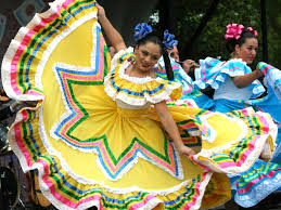 Dancing in a parade, many women tend to be dressed in long traditional flowered dresses. While the majority of events happen in Puebla Mexico, there is also a huge parade that happens right in Mexico City.