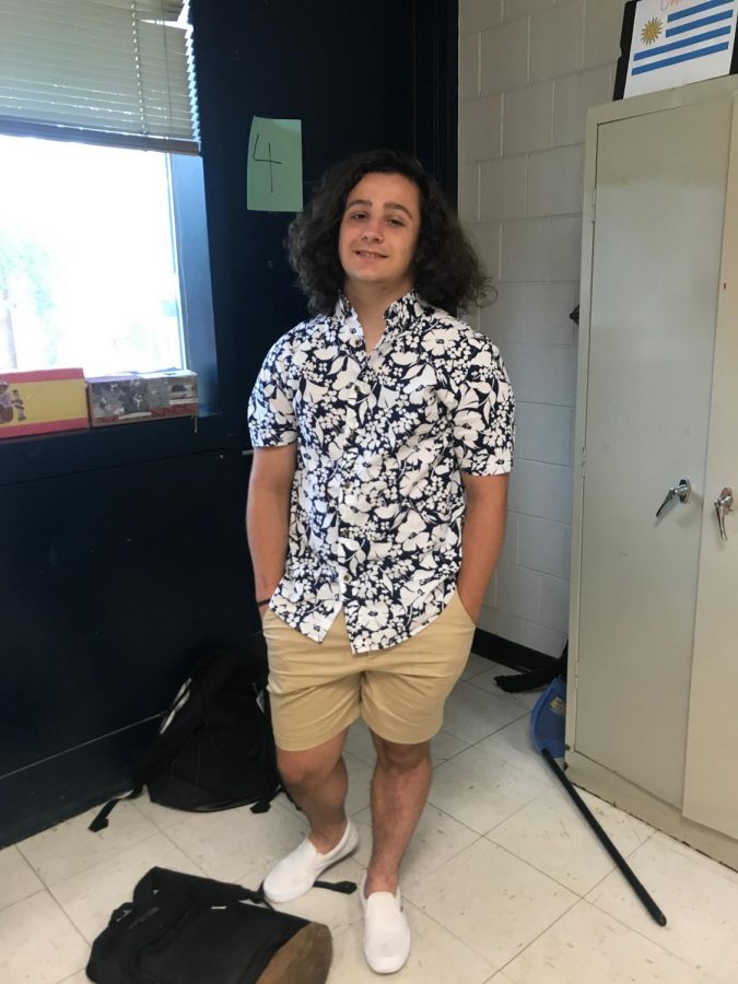 Getting an early start in showing off his summer style, sophomore Skylar Wechsberg rocks his favorite trends here at Millbrook! Hawaiian shirts and Vans are both very popular choices for men’s fashion.  