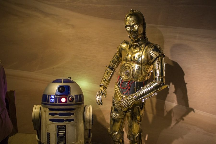 Standing+side+by+side+these+two+droids+known+as+C-3po+and+R2-D2+are+staples+of+the+Star+Wars+franchise.+These+characters+along+with+a+plethora+of+others+from+the+Star+Wars+universe+transcend+the+screen+and+are+household+names.++