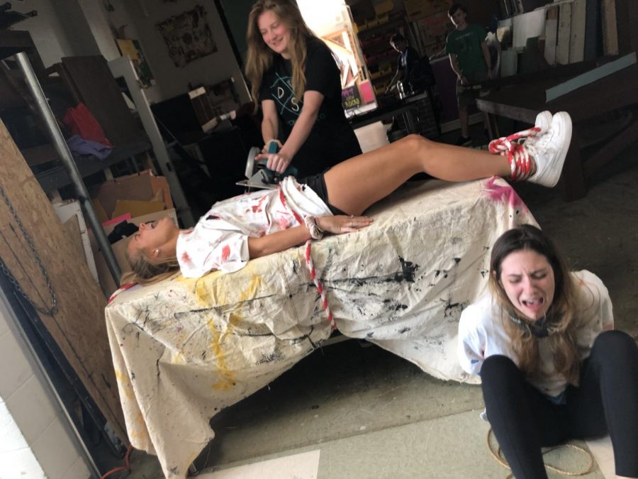 Rehearsing for the big night, seniors Morgan Hardy, Ashlyn Connel, and Avery Glenn practice their scene based off of the movie Saw. To see this fright and more, come to Eklektikos tonight at 7 PM!