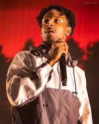 A well-known mumble rapper, 21 Savage, performs at a concert in Texas. He is most popular for his mumble rap style that includes famous hits such as “Bank Account” and “a lot”. 