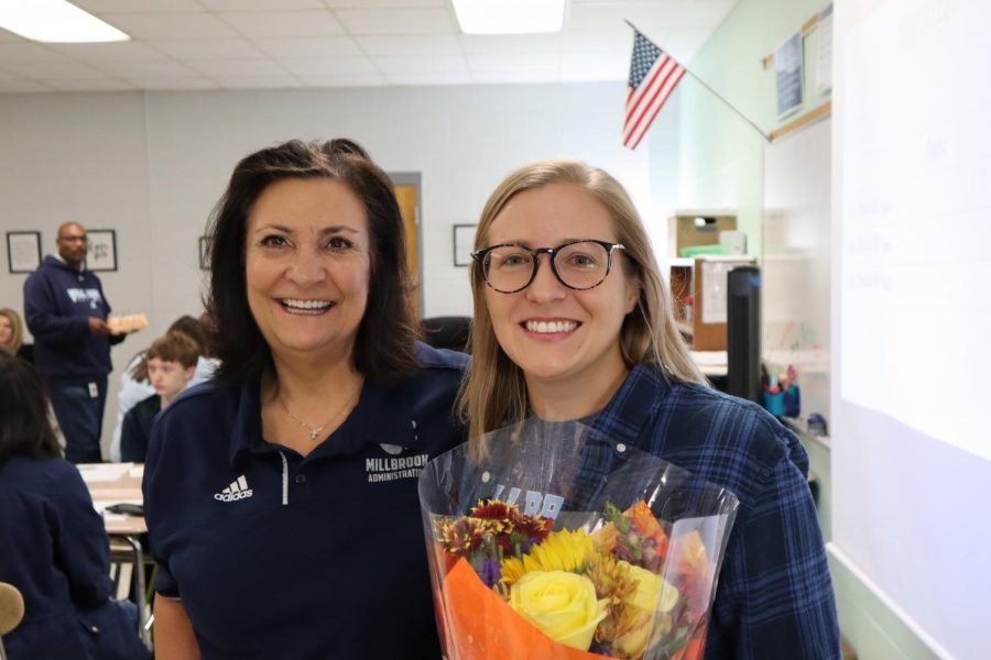 Posing+with+Principal+Dana+King%2C+2019+Teacher+of+the+Year+Ms.+Fritz+is+evidently+beaming+with+pride%21+She+has+invested+much+of+her+time+and+energy+into+Millbrook+and+has+now+been+recognized+for+her+involvement%2C+much+to+the+amusement+of+students+Will+Mitchell%2C+Avery+Glenn%2C+and+countless+others%21+