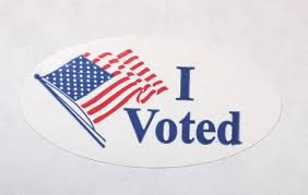 Depicting the waving American flag, this “I voted” sticker can be found on many proud Americans’ shirts on Election Day. By making Election Day a Federal Holiday, many more Americans would be able to wear this sticker, without sacrificing anything else. 