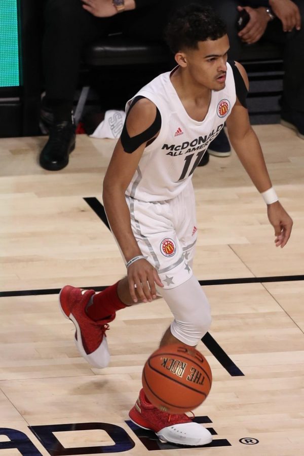 Looking+for+an+open+teammate+and+the+best+shot+available%2C+Trae+Young+prepares+to+make+a+decision+as+the+shot+clock+draws+to+an+end+in+the+McDonalds+All-American+Game.+Young+now+lights+up+scoreboards+across+the+country+for+the+rebuilding+Atlanta+Hawks+and+will+likely+make+his+first+All-Star+team+in+February.