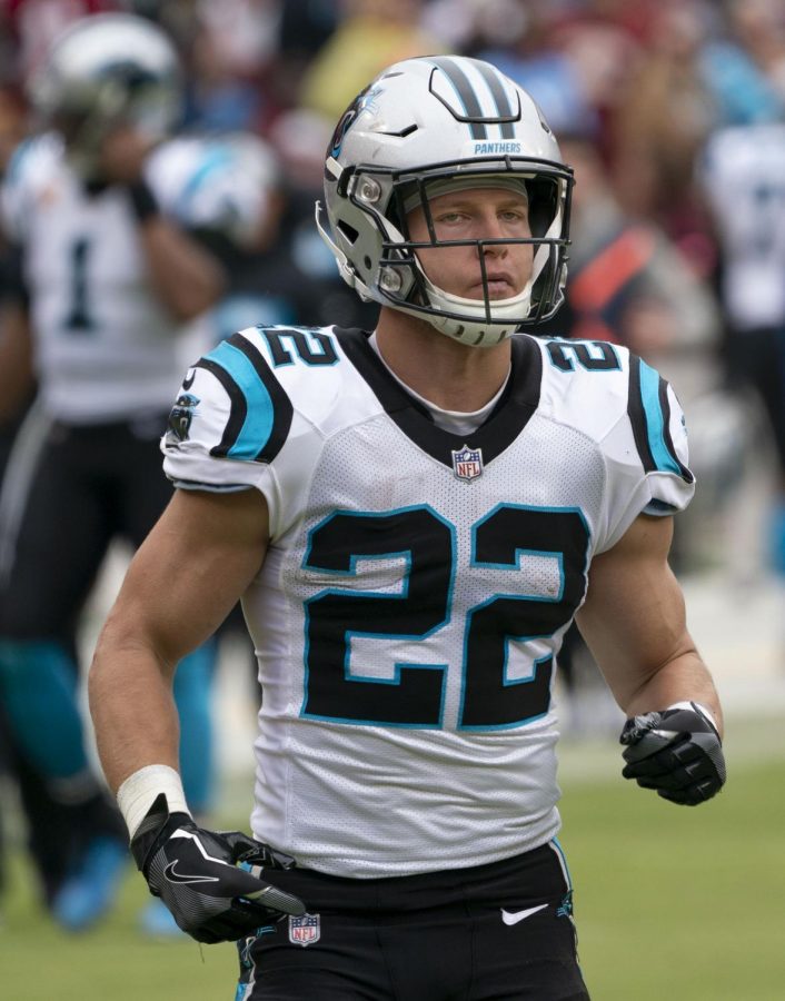 Jogging across the field, Christian McCaffrey takes a break between plays during his game against the Redskins in Week 13 of the 2019 season. While the Panthers have not had the best season, Christian McCaffrey has proven himself as a remarkable running back by breaking several records and achieving impressive stats.
