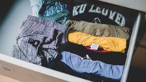 Another great way to organize clothing items such as t-shirts is by folding them to the point where you can clearly see the logo or type of shirt. By organizing your clothes, it will become much easier and faster to pick out an outfit for the day ahead!